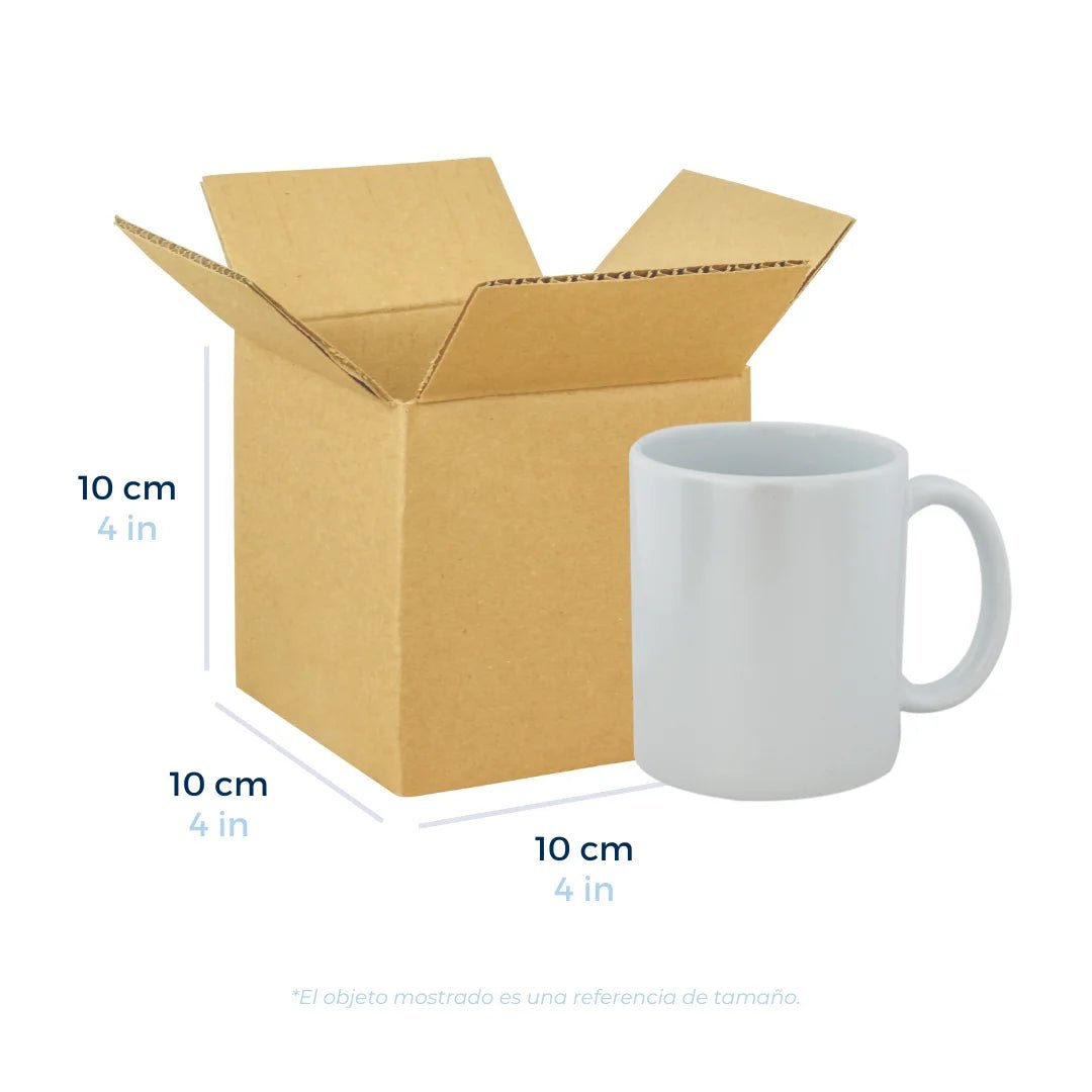 Cajas de Cartón Regulares, medida 10 x 10 x 10 cm. Con una taza a un lado como referencia de tamaño. Para Paquetes.